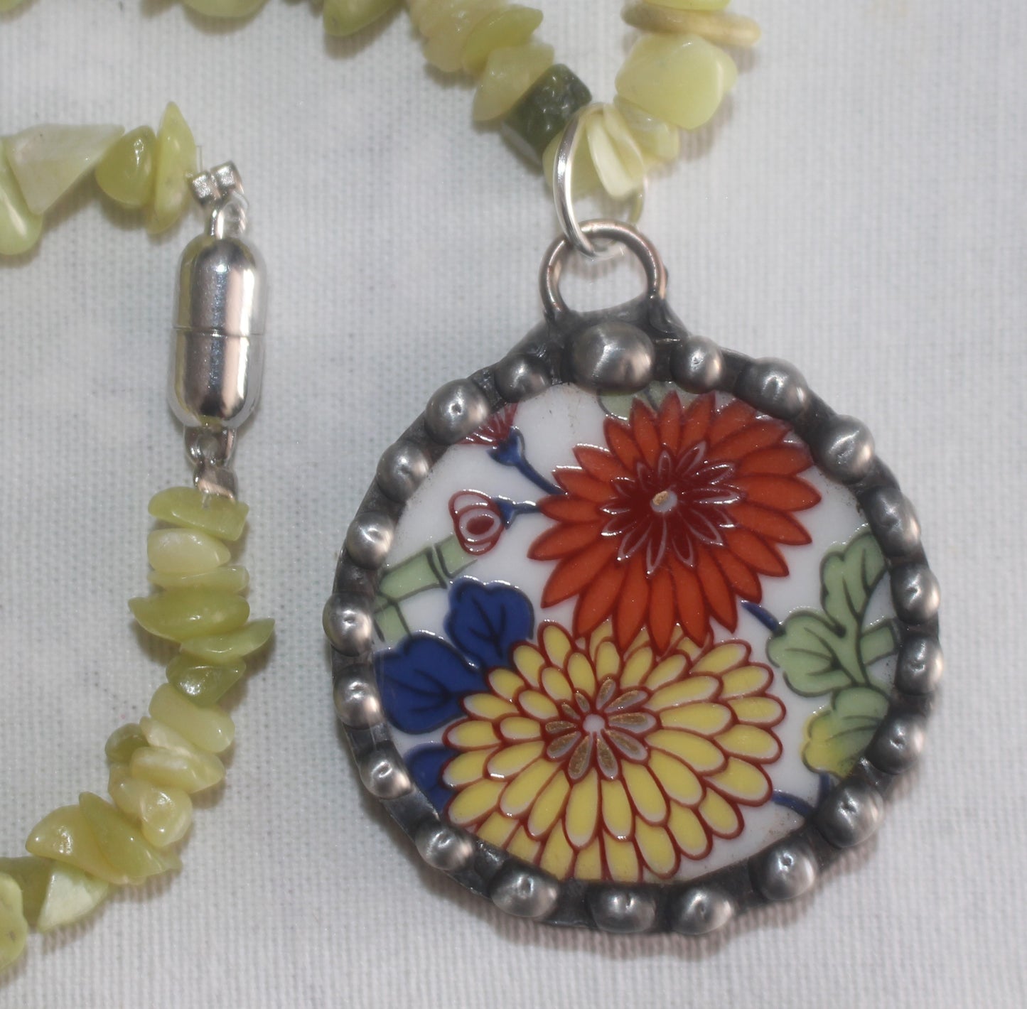 Vibrant Yellow and Orange Chrysanthemums Round Pendant