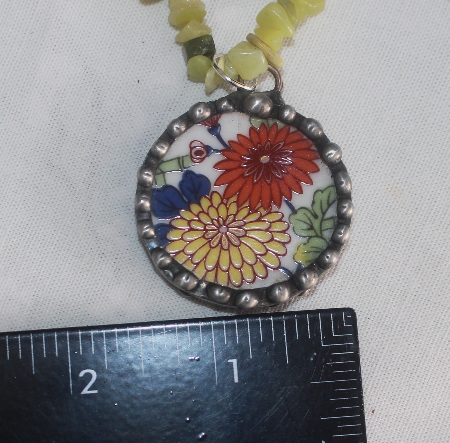 Vibrant Yellow and Orange Chrysanthemums Round Pendant