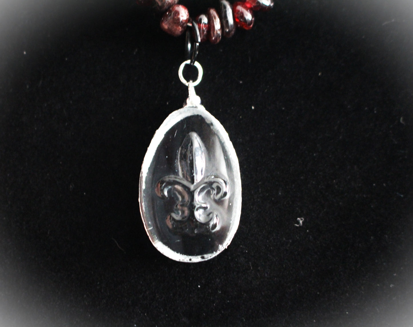 Fleur De Lis Pendant with Garnet