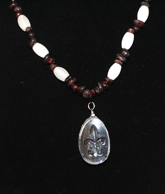 Fleur De Lis Pendant with Garnet