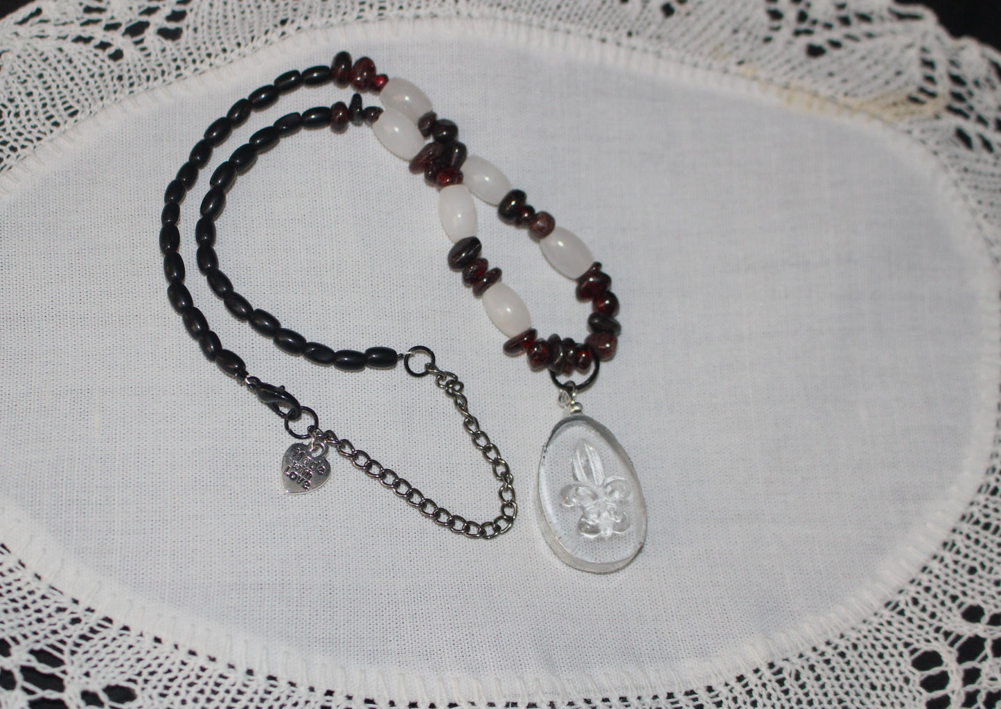 Fleur De Lis Pendant with Garnet