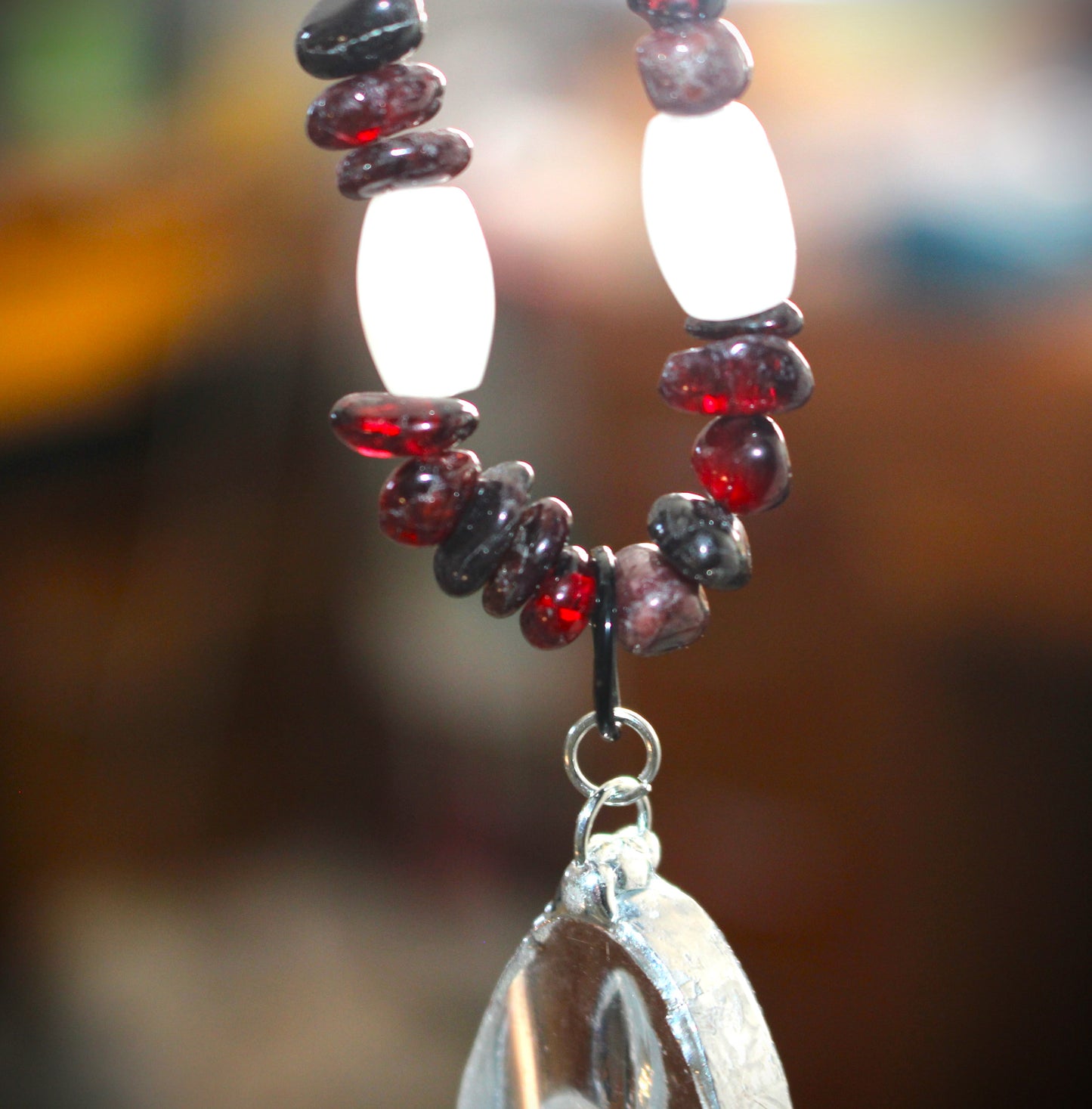 Fleur De Lis Pendant with Garnet